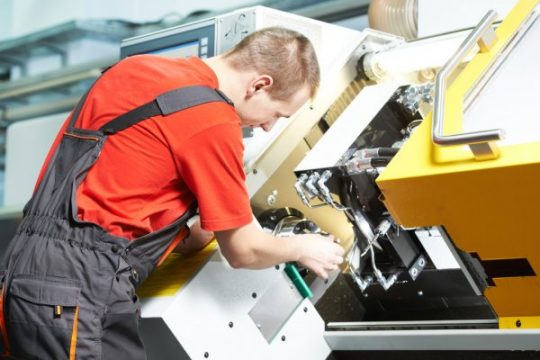 depositphotos_21718165-stock-photo-worker-operating-cnc-machine-center depositphotos_21718165-stock-photo-worker-operating-cnc-machine-center